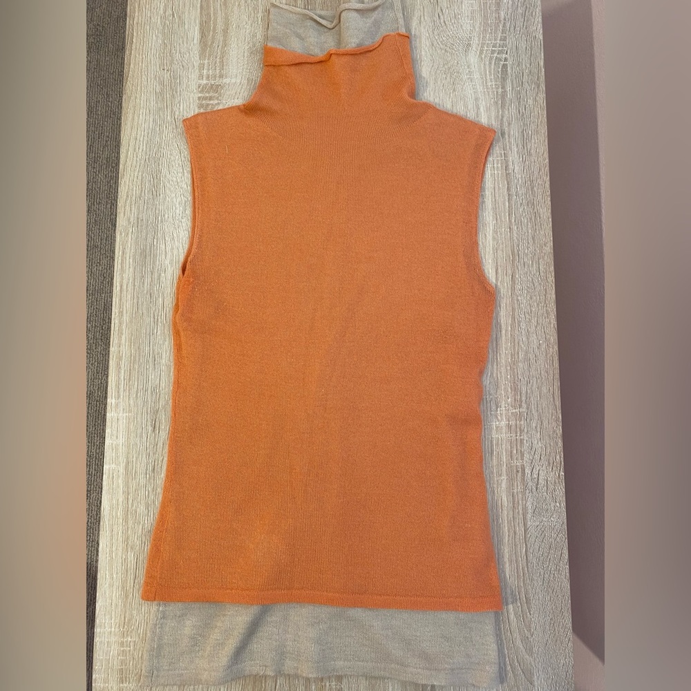 Brunello Cucinelli cashmere, sleeveless turtle neck sweater. Size small.